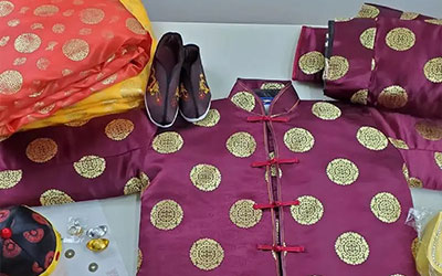 寿衣一般几个扣子？传统寿衣扣子数量有讲究吗？