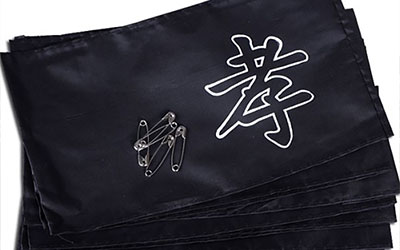 丧事礼仪中为何要佩戴黑色孝布？